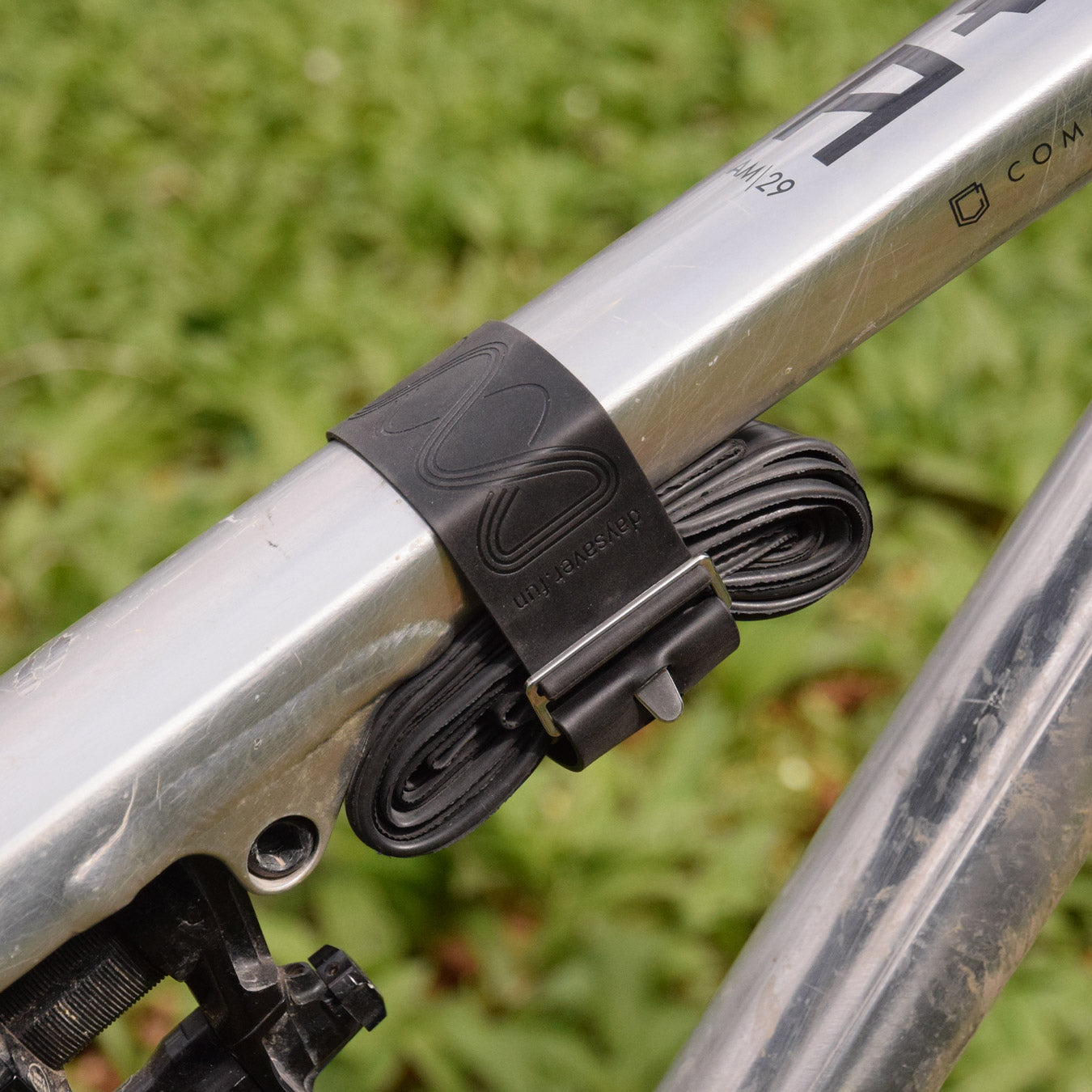 Whip strap with tube on the bike