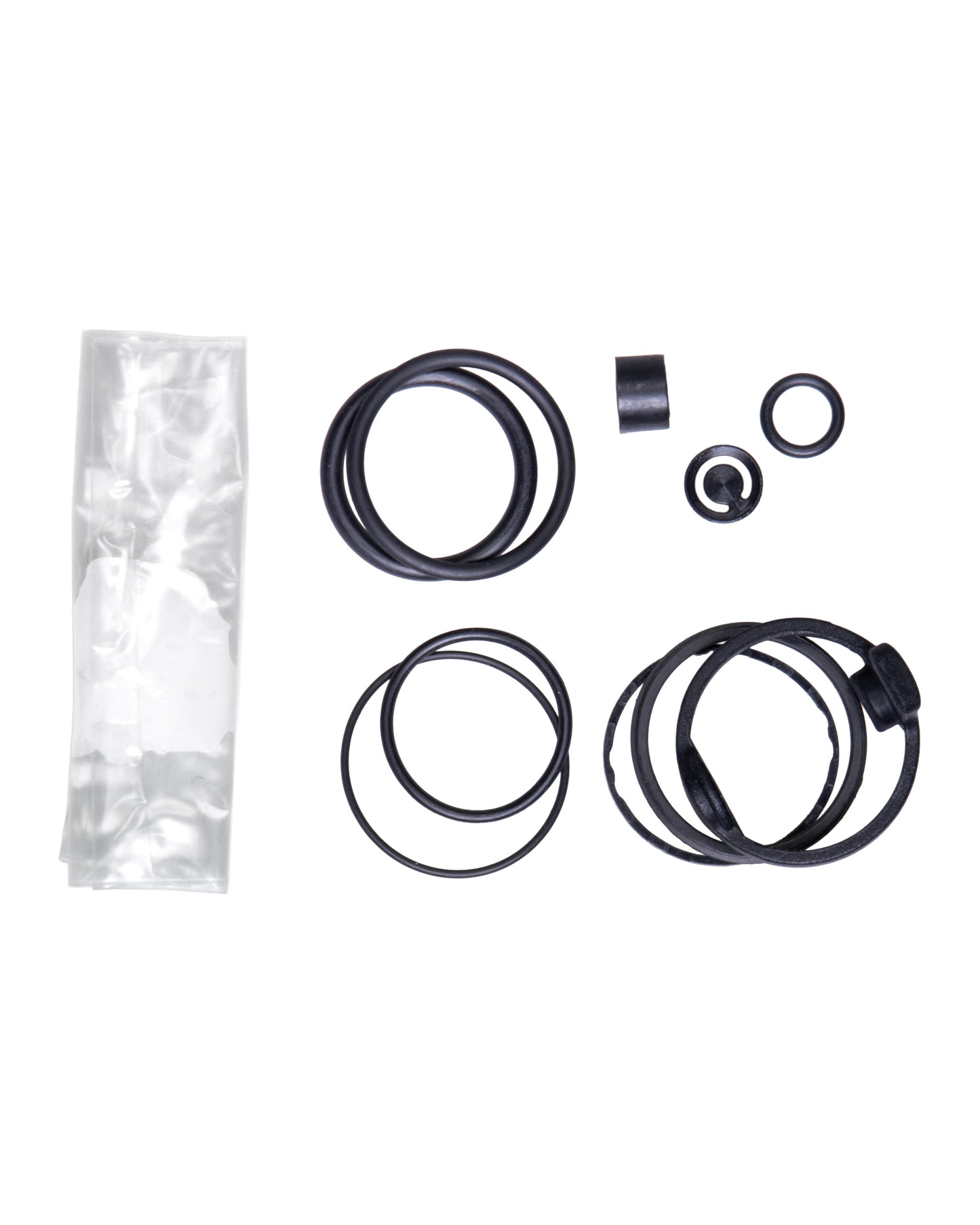 Set of mechanical seals and components on a white background