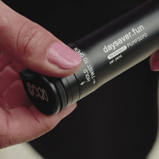 Person holding a bicycle pump