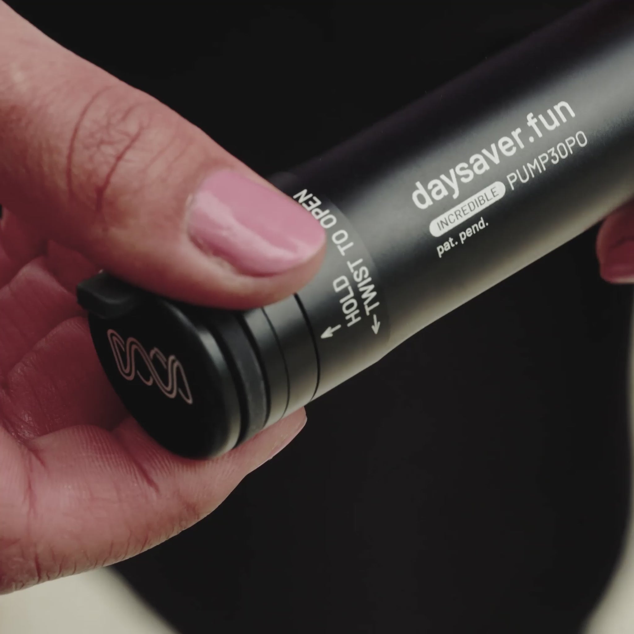 Person holding a bicycle pump
