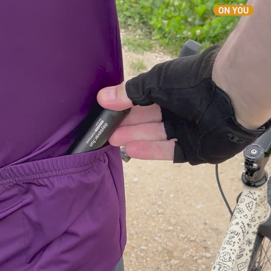 Bike pump in a jersey pocket