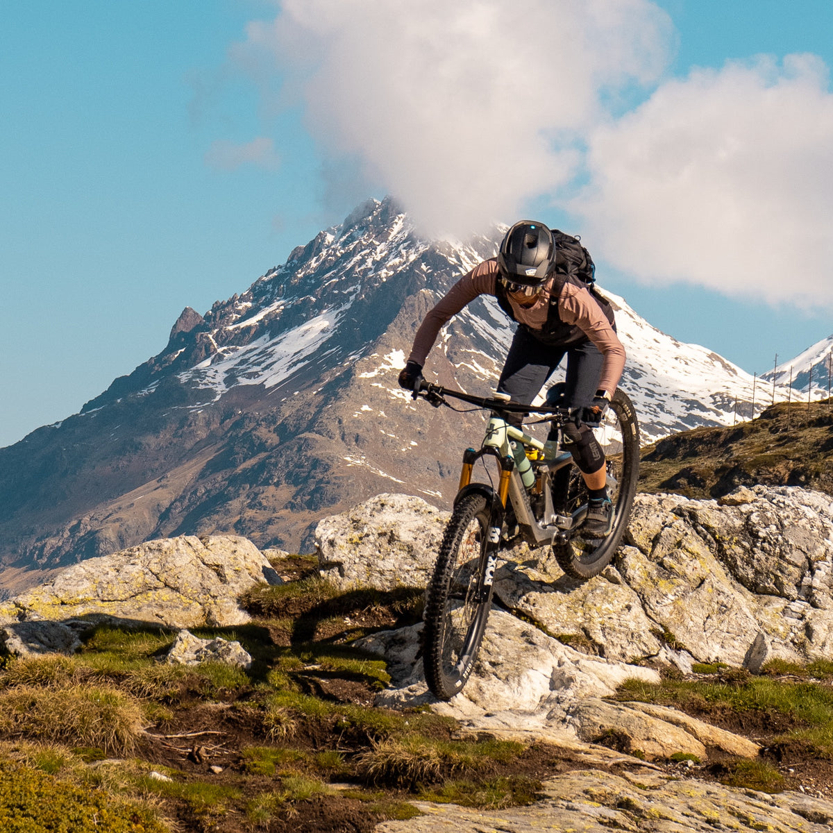 woman riding a mtb in the mountains