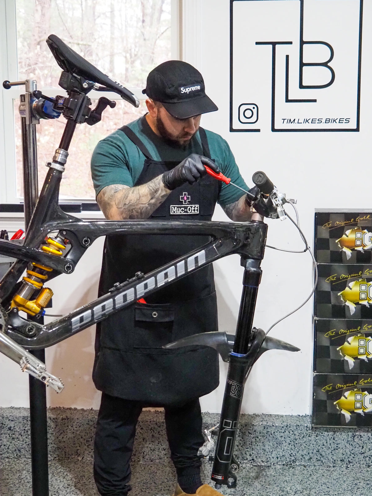 man fixing a bike